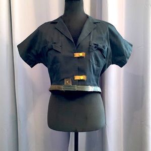 Hand-made heavy cotton & leather women’s top. No tags. Probably small.  Boutique